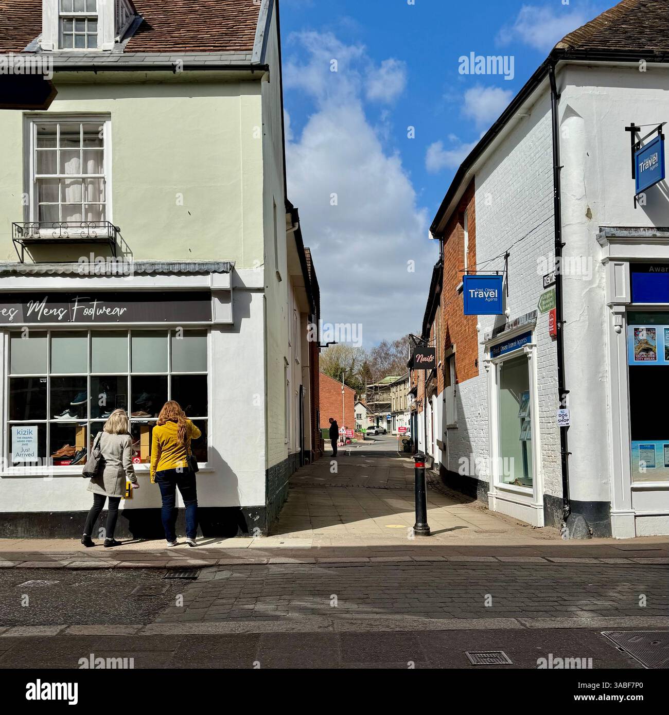 Woodbrifdge, Suffolk - 30 March 2025 : Hot Sunday afternoon for shoppers in the town centre. - Smartphone Captured Stock Image