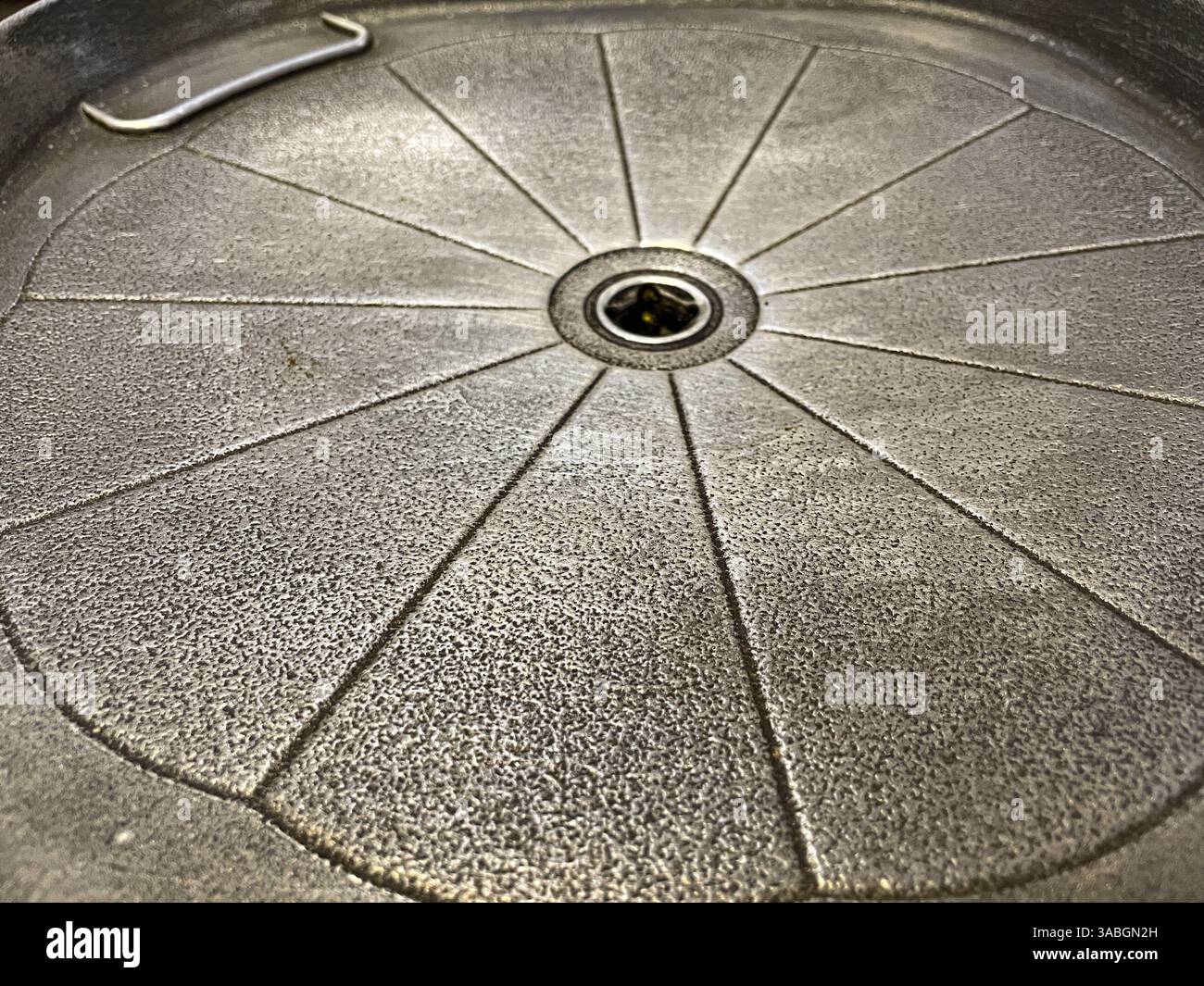 A Korean-style grill pan in close up view as background - Smartphone Captured Stock Image