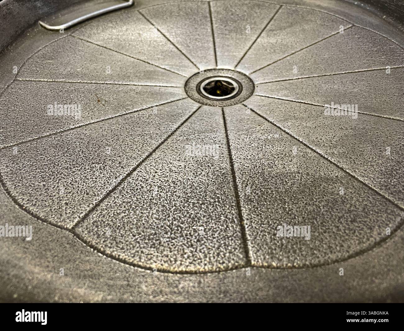 A Korean-style grill pan in close up view as background - Smartphone Captured Stock Image