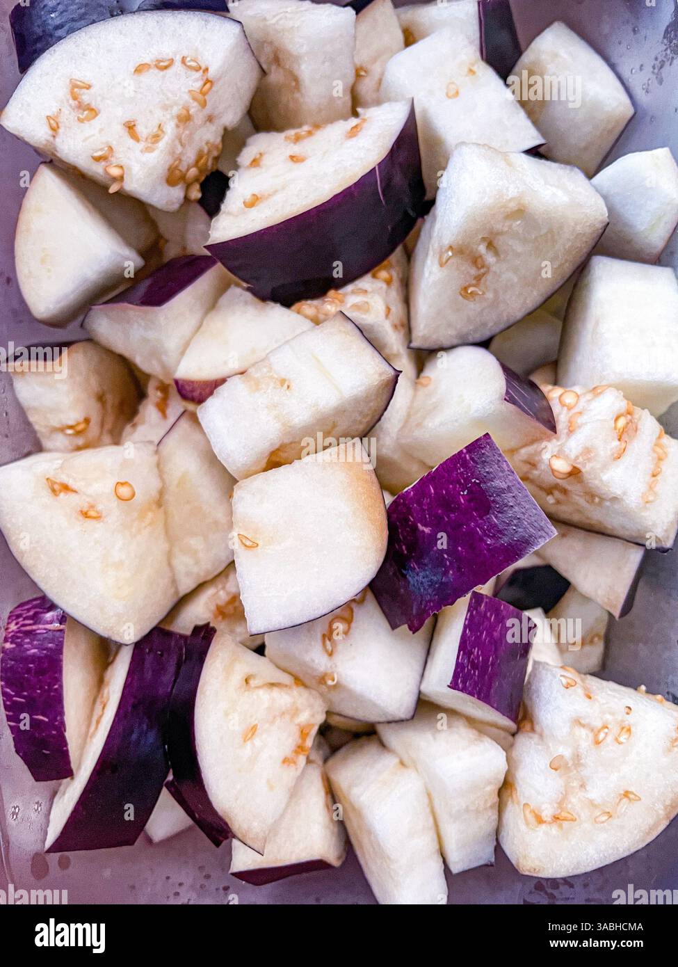 close up view of eggplant slices ready to be cooked - Smartphone Captured Stock Image