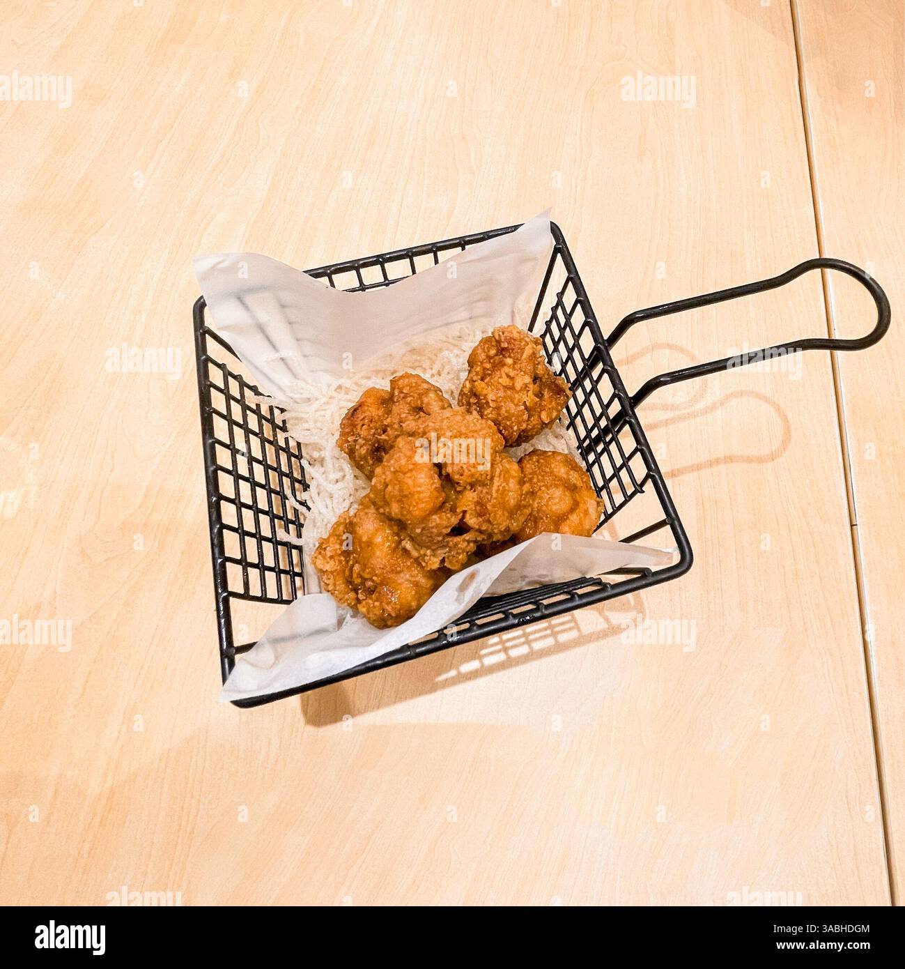 Delicious boneless chicken, Chicken Karage served in a basket ,top view - Smartphone Captured Stock Image