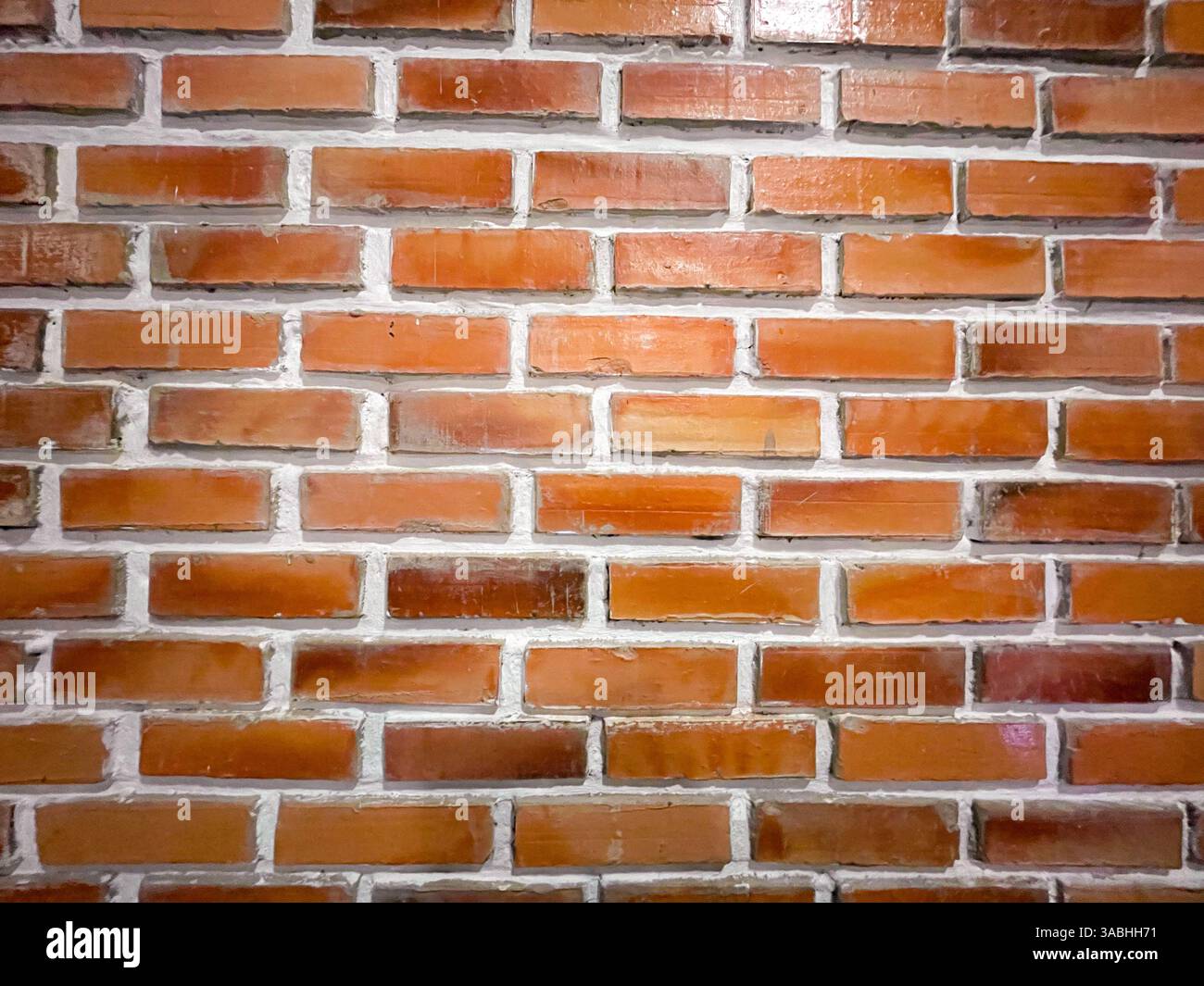 Old wall background with stained aged red bricks - Smartphone Captured Stock Image