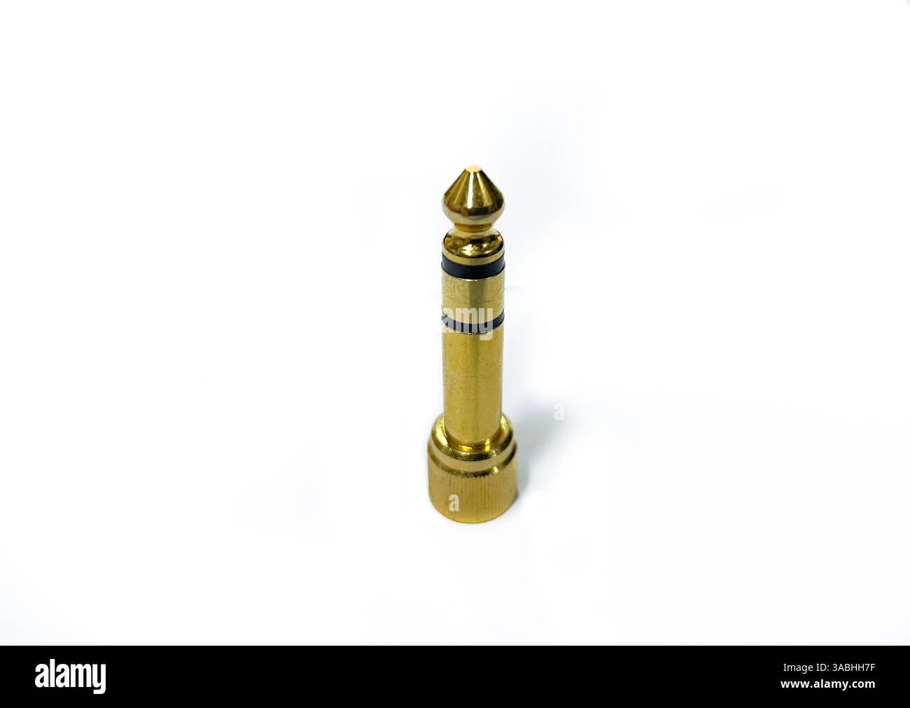 Jack 3.5mm to 6.3mm adapter isolated on white background - Smartphone Captured Stock Image