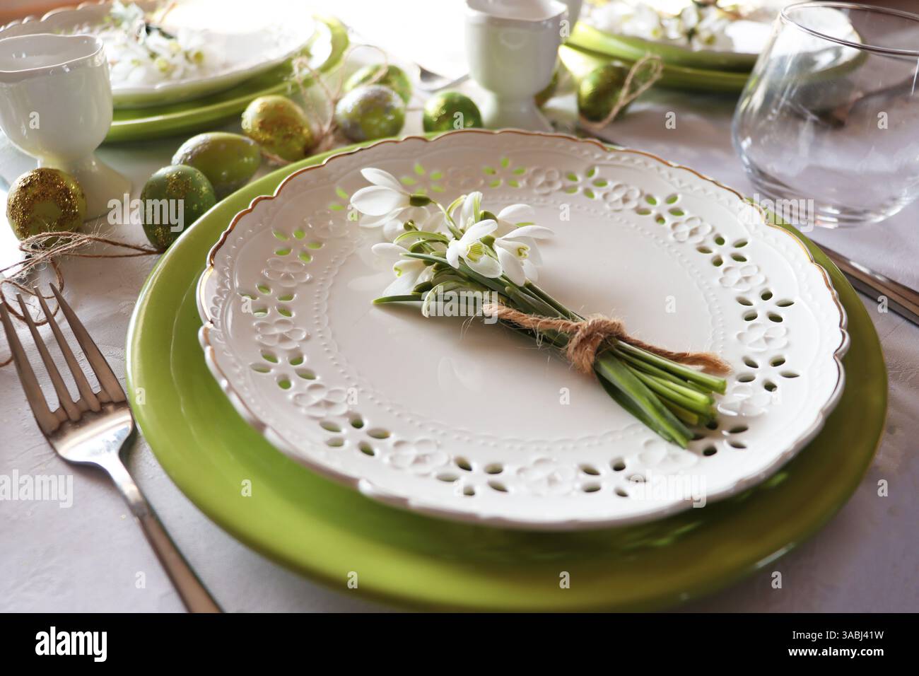 Stylish Easter table setting . Easter festive table decorations Stock Photo