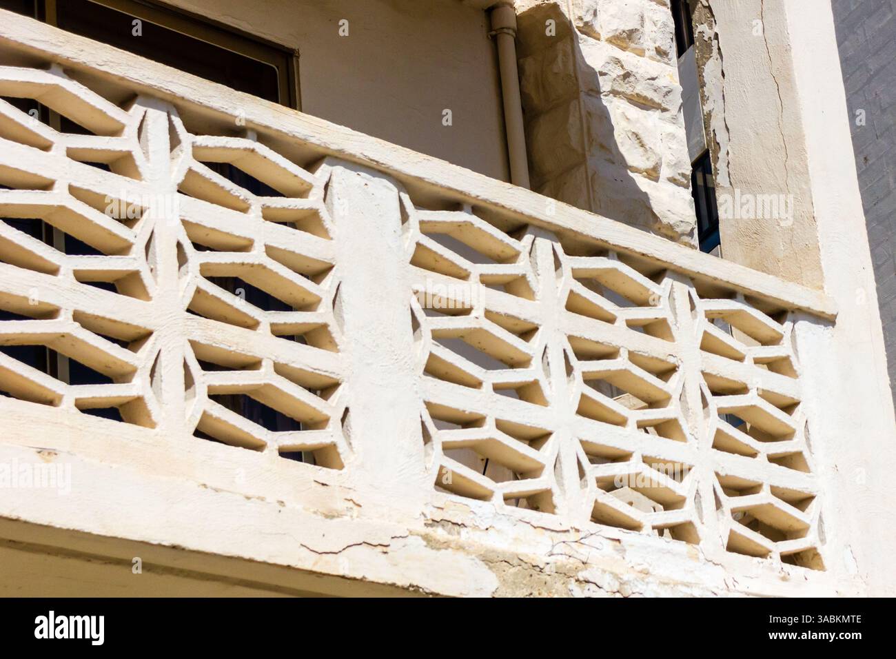 Elegant Architectural Detail of a Textured White Brick Balcony Railing ...