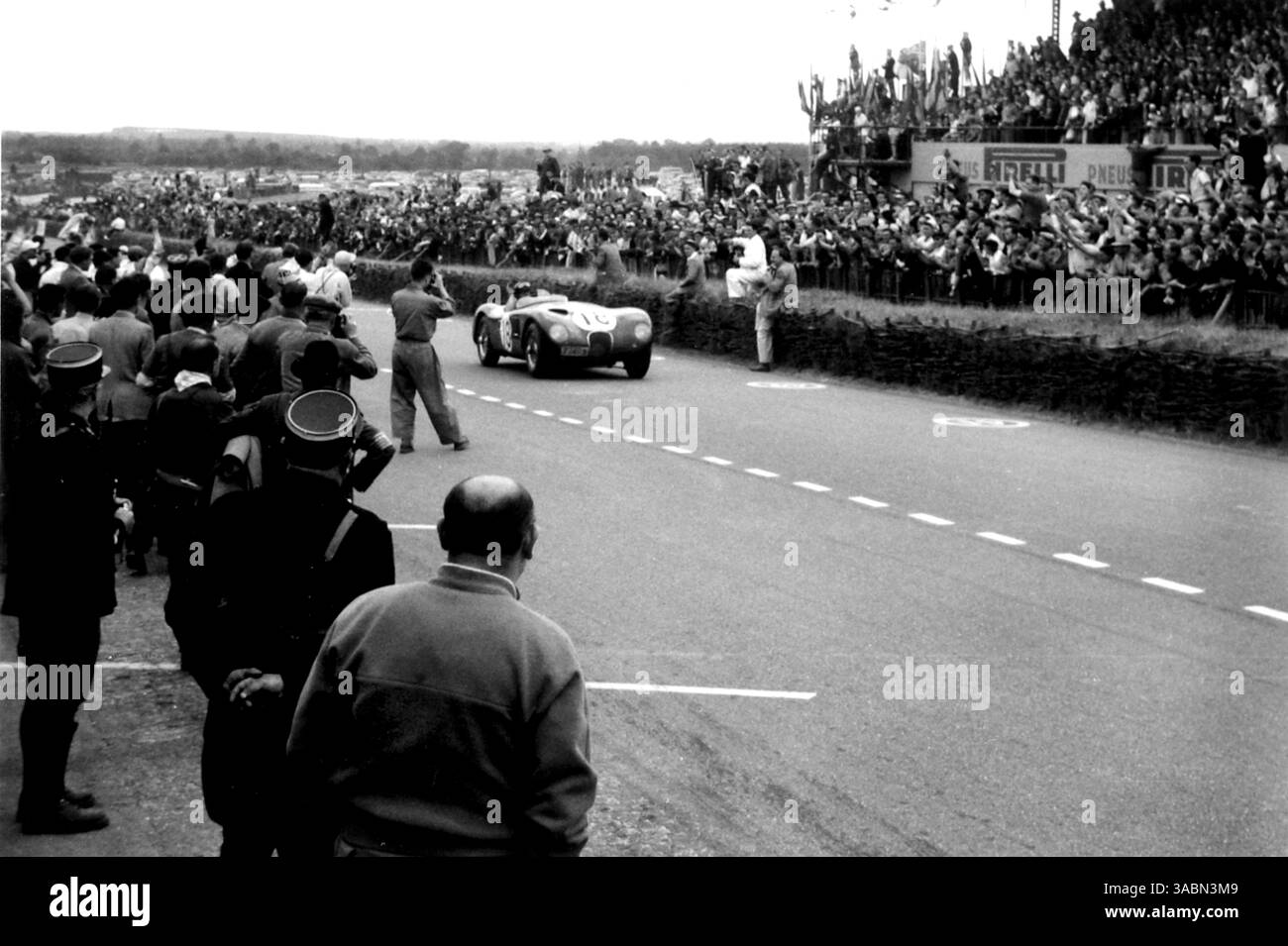 Winner, Duncan Hamilton (GBR) brings the winning Jaguar C-Type he ...