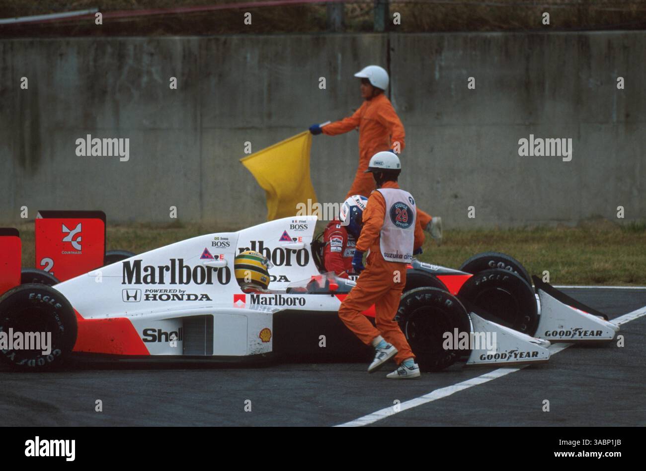 Alain Prost at Hungaroring in 1988, driving a McLaren MP4/4. Qualified 7th (1.143 behind his teammate Ayrton Senna on pole) and finished 2nd. Was the ninth time he saw the chequered flag