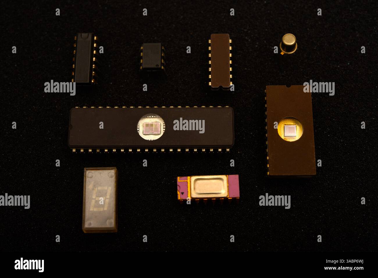 Several microchips on black foam. Old integrated circuits for radio electronics. Stock Photo