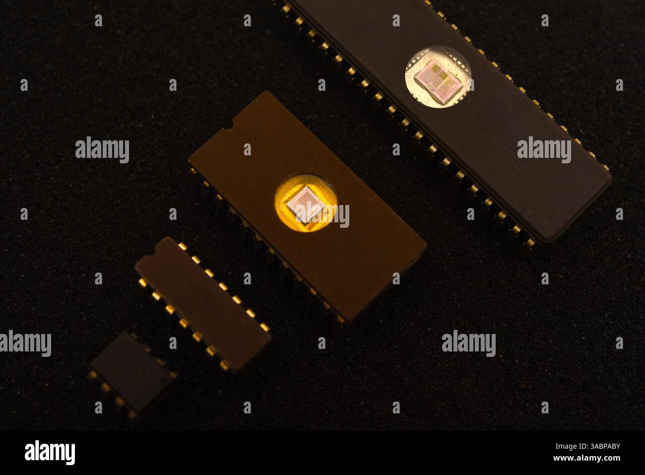 Several microchips on black foam. Old integrated circuits for radio electronics. Stock Photo