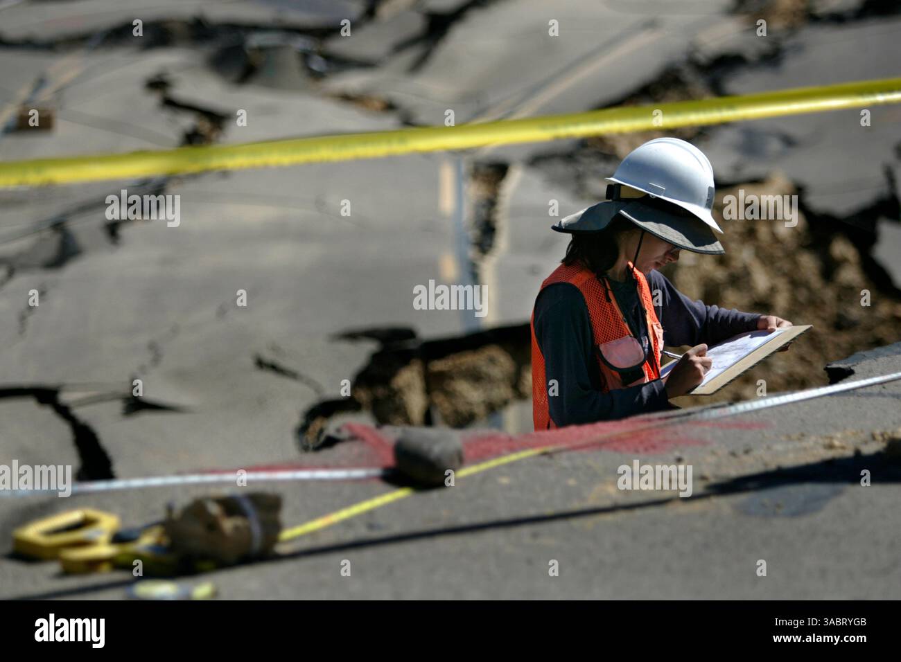 Oct 07, 2007 - San Diego, California, USA - FATEN KHATIB who works for a private consulting firm hired by the city, works on detailing a profile of the soil in the land slide area  on Soledad Mountain Road on the south side of the landslide. (Credit Image: © Nancee Lewis/San Diego Union Tribune/ZUMA Press) RESTRICTIONS: LA and Orange County Papers RIGHTS OUT! and USA Tabloid RIGHTS OUT! Stock Photo