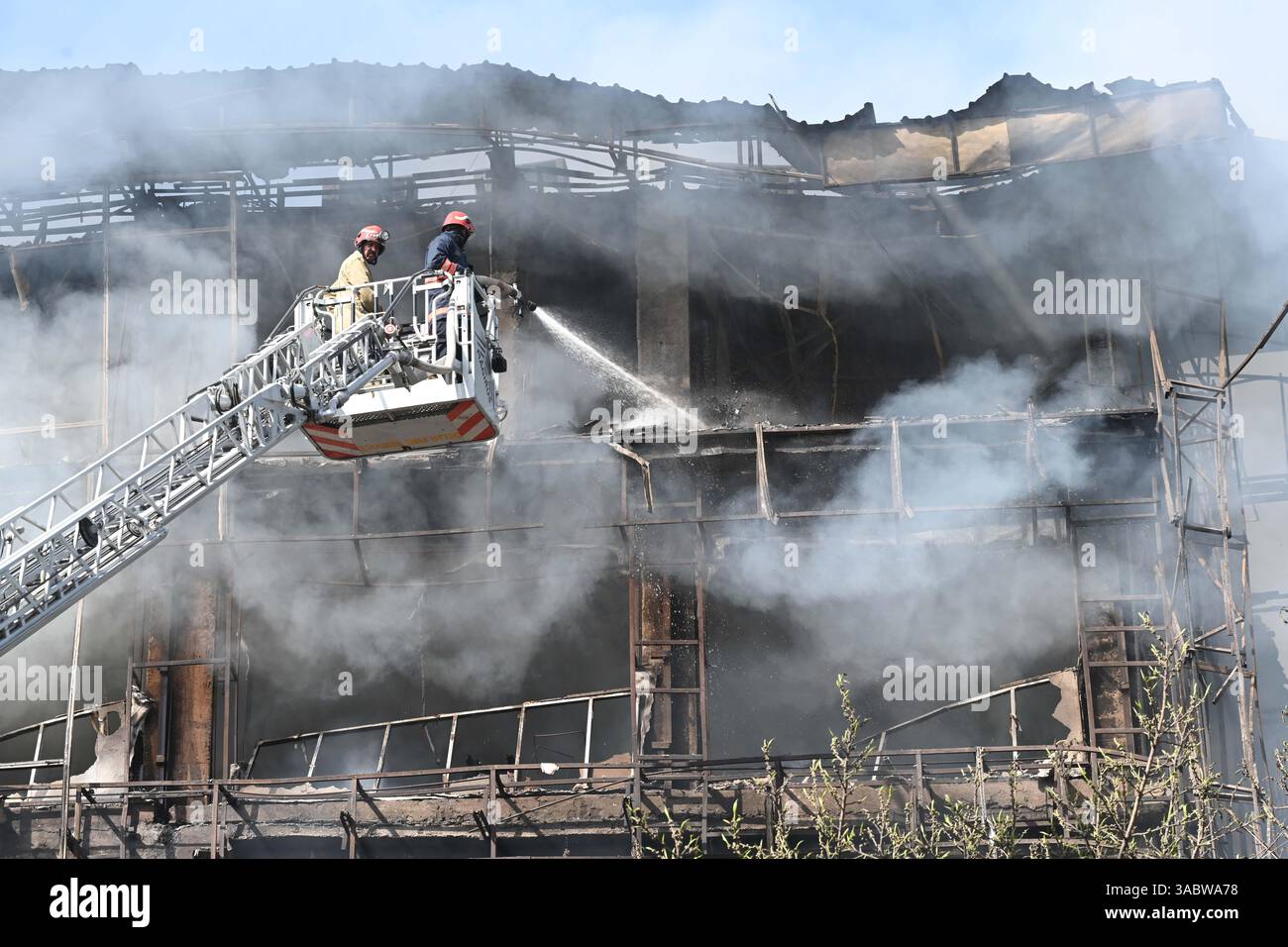 NEW DELHI, INDIA - APRIL 1: Firefighters try to douse a fire that broke ...