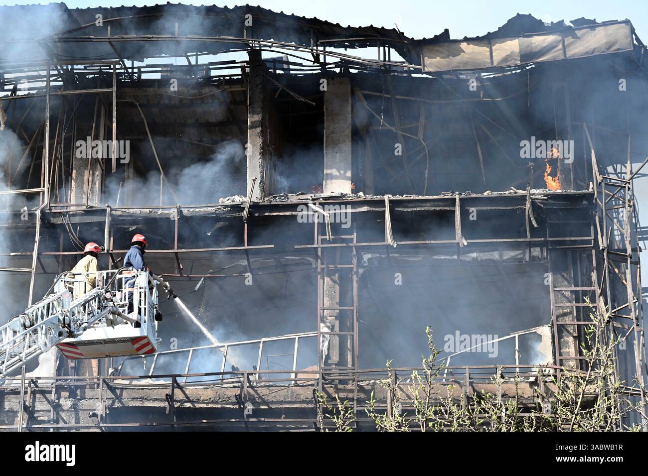 NEW DELHI, INDIA - APRIL 1: Firefighters try to douse a fire that broke ...