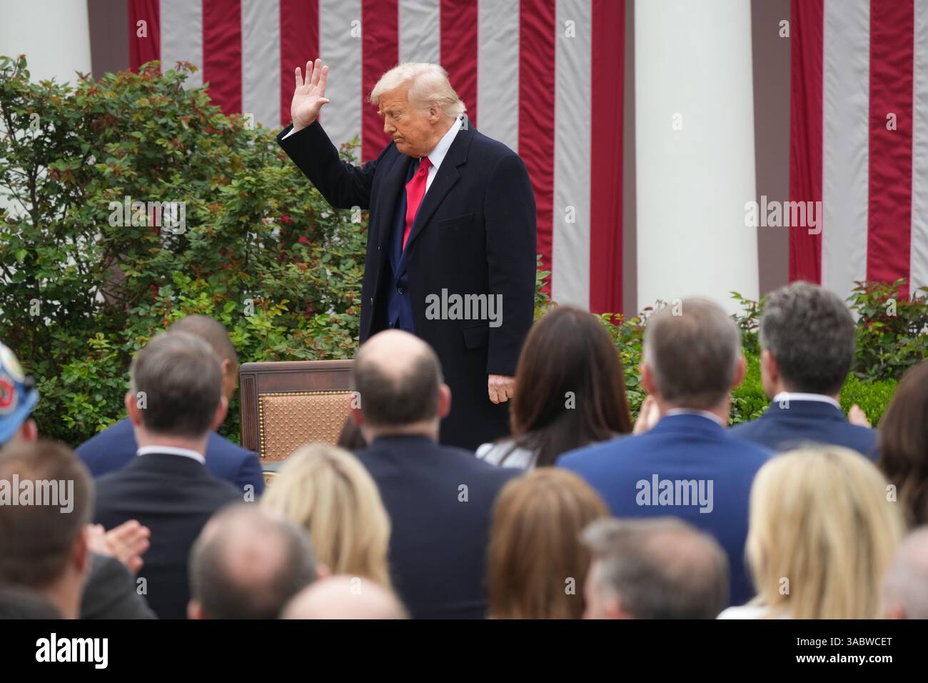 United States President Donald J Trump waves to the crowd after ...