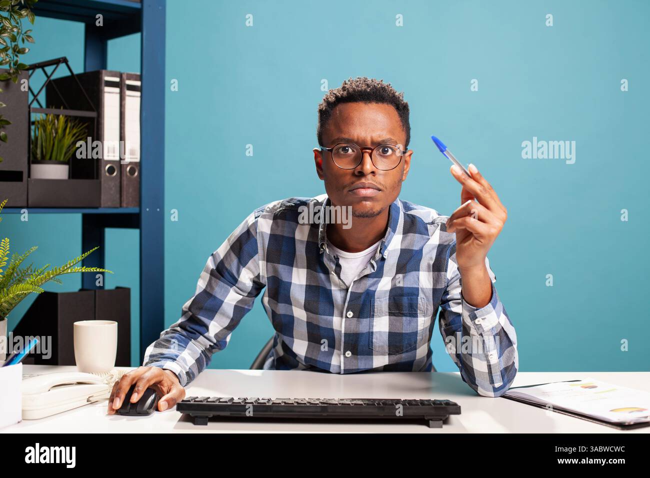 Data updating finance analyst leaning hi-res stock photography and ...