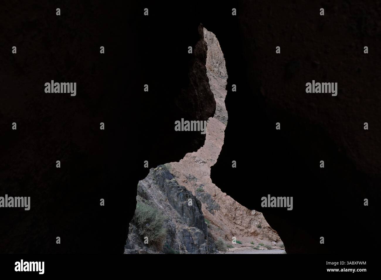 Passage between two rocks in the Charyn canyon Stock Photo - Alamy