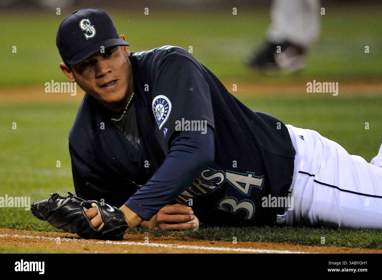 April 11th, 2008 - Seattle, WA.Felix Hernandez # 34 of Seattle dives but misses while trying to catch a bunt against Los Angeles at Safeco Field in Seattle..Mariners defeat Los Angeles 8 - 5.George Holland / Cal Sport Media. (Credit Image: © Cal Sport Media/ZUMA Press) Stock Photo