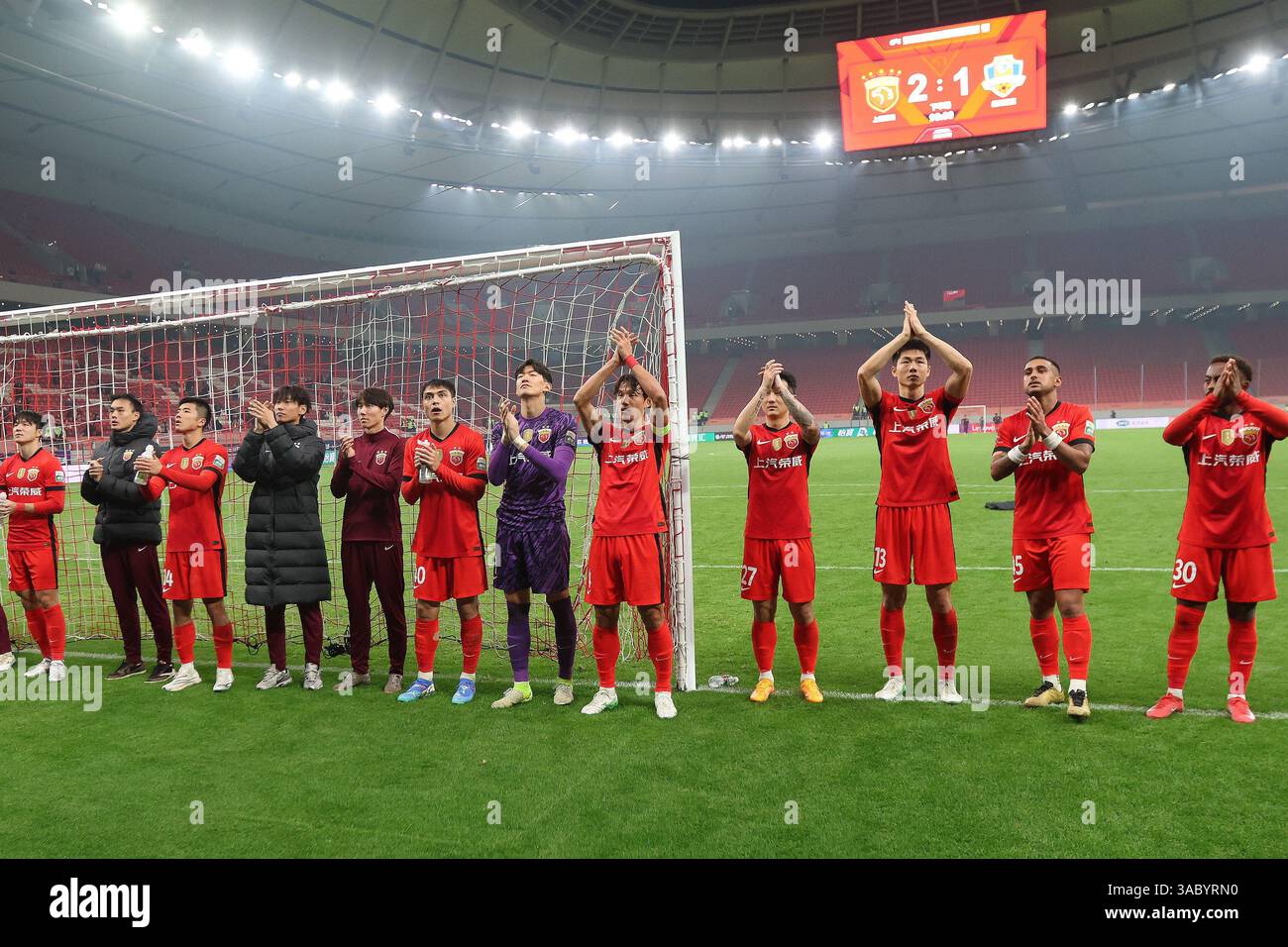 Shanghai Port Football Club defeated Meizhou Hakka Football Club with 2 ...