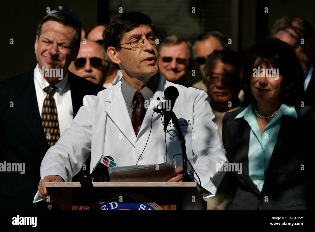 (Published 1/21/2006, A-14)  Ted Mazer, president of San Diego County Medical Society, center, is flanked by Rep. Bob Filner, left, and Rep. Susan Davis, right, during a press conference held at Kimball Senior Center in National City, on the disasterous implementation of Medicare Part D, which is supposed to provide drug prescription benefits to seniors who are covered by Medicare.---Laura Embry/Union-Tribune Stock Photo