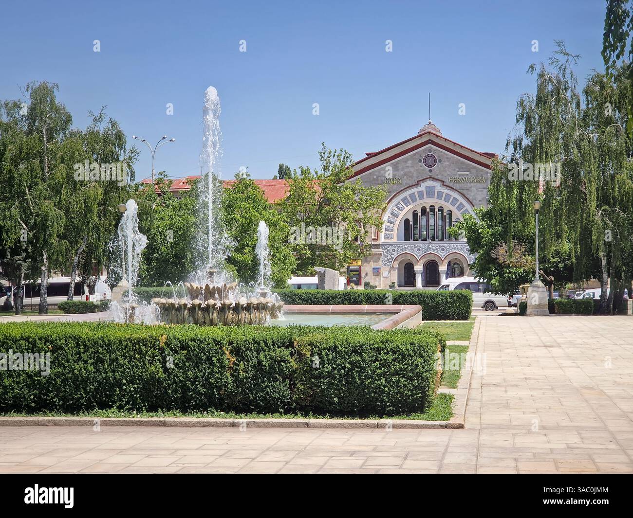 Chisinau railway station with a view from the square with splashing fountain, Republic of Moldova - Smartphone Captured Stock Image