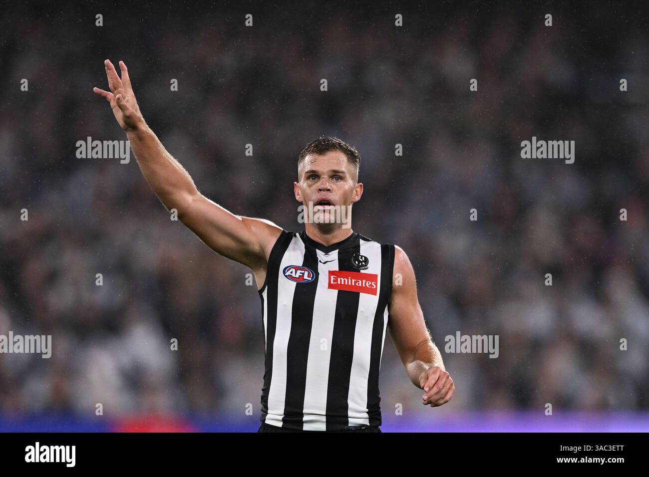 Dan Houston of Collingwood reacts during the AFL Round 4 match between ...
