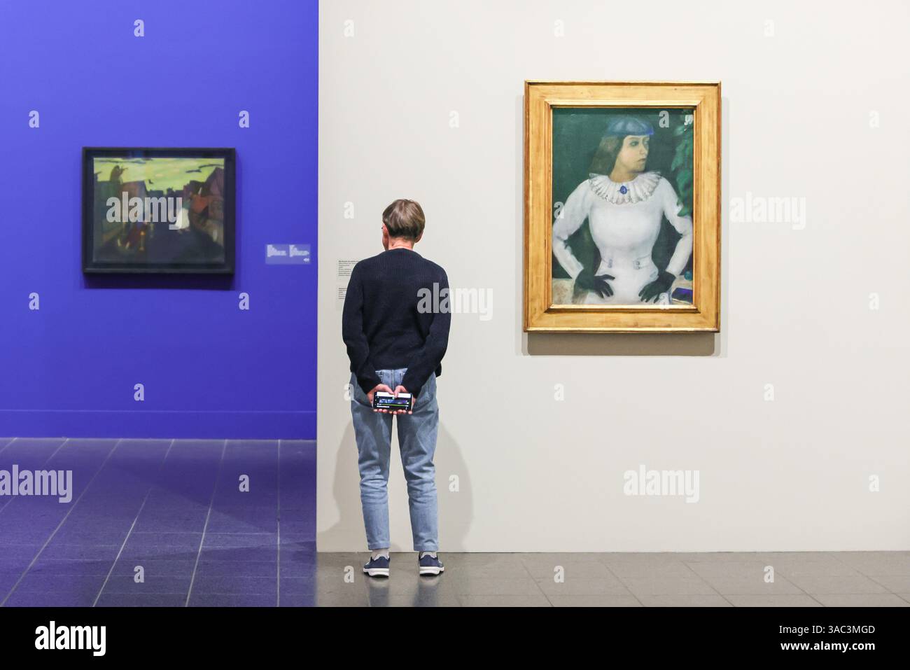 People look at Marc Chagall, My financee with black gloves, Ma fiancée aux gants noirs, 1909, K20 Museum Dusseldorf Stock Photo