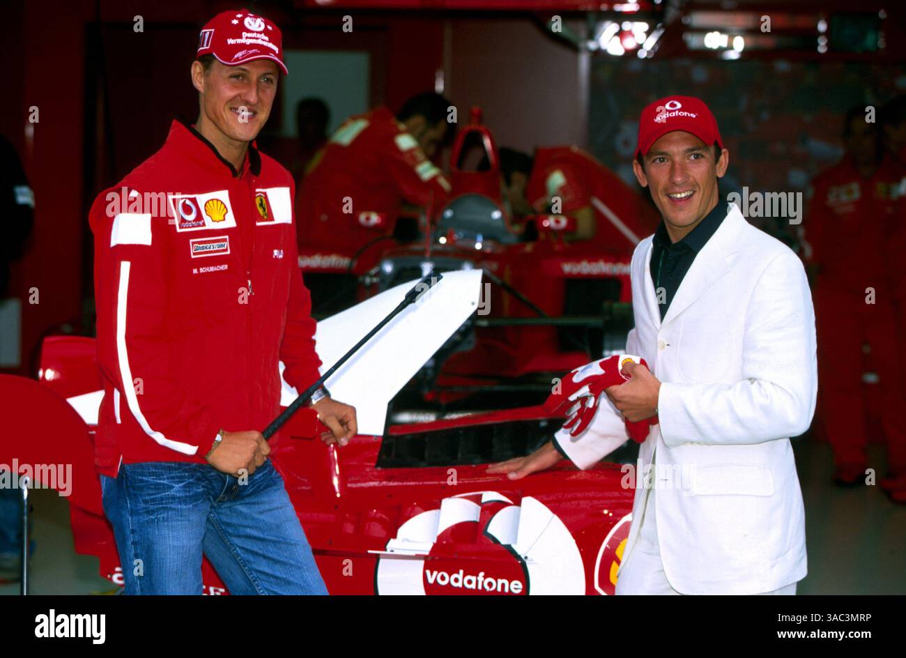 L to R): Fourth placed Michael Schumacher (GER) Ferrari met legendary ...