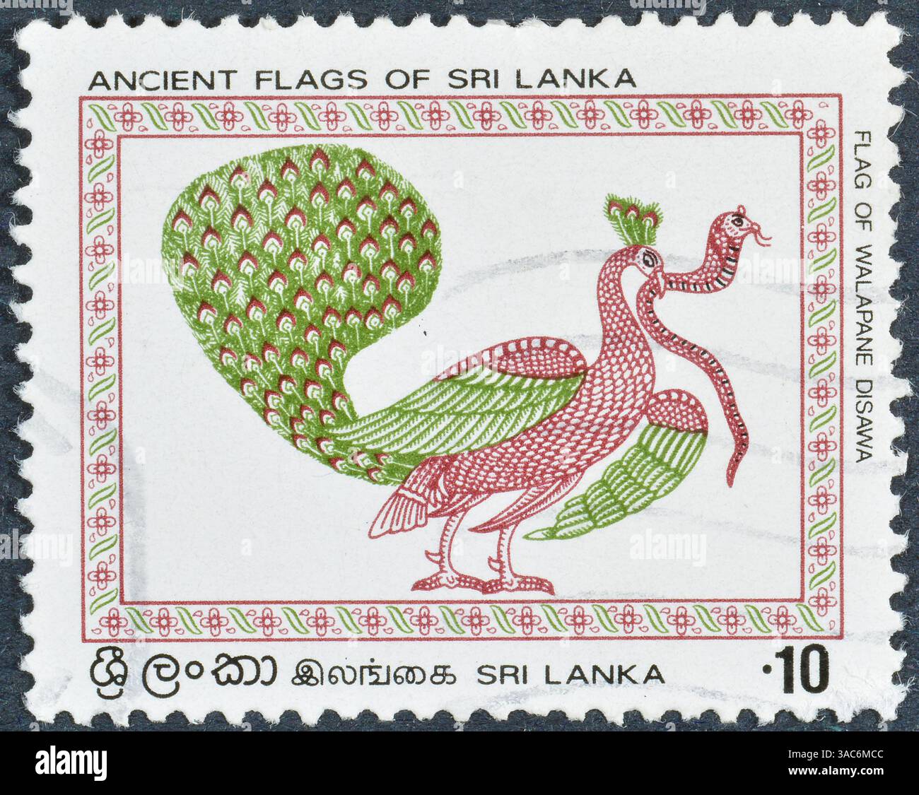 Cancelled postage stamp printed by Sri Lanka, that shows Peacock Banner ...