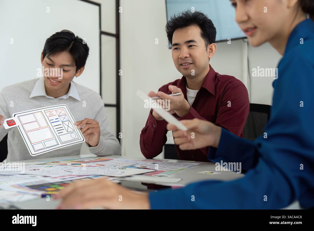 Collaboration and UX UI Design. A diverse group of professionals ...