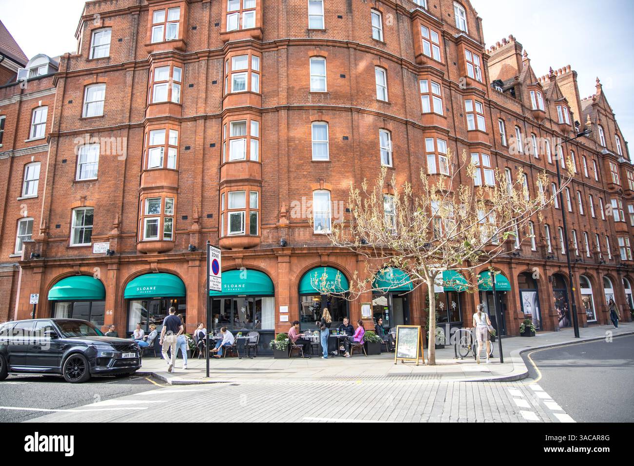London, UK - September 14, 2023: Sloane Place Restaurant. People eating outside. Stock Photo