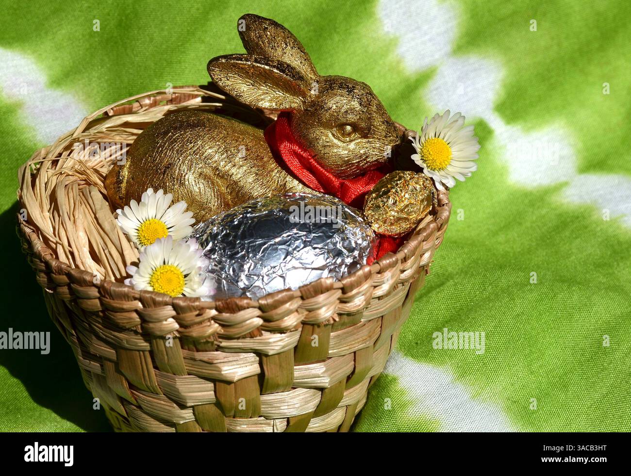 Easter Bunny with Silver and Gold Eggs Stock Photo