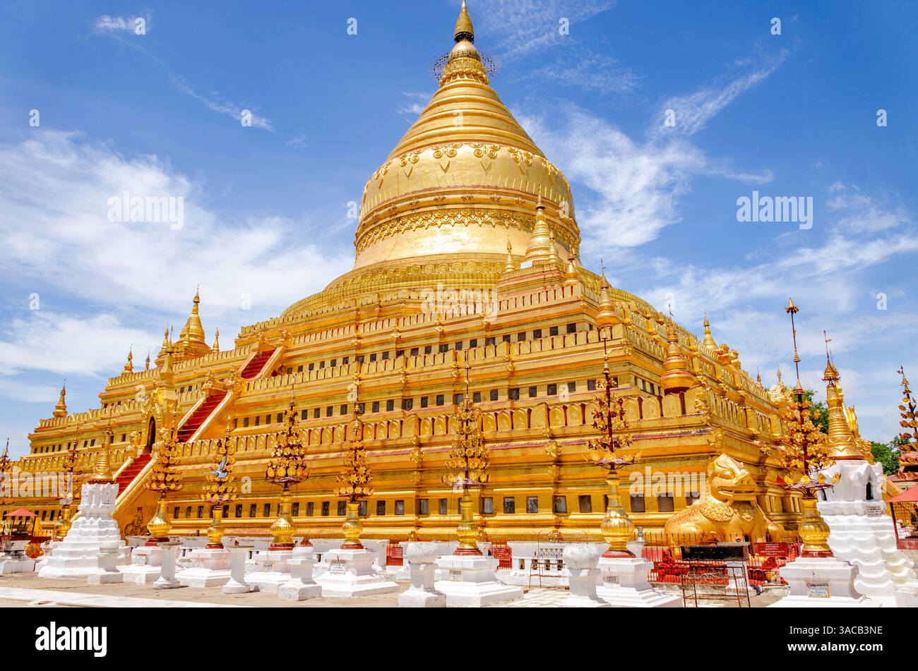 Shwezigon Pagoda, Bagan, Myanmar. Wide angle view of Burmese Golden temple built next to Irrawaddy River in 1100AD. Stock Photo