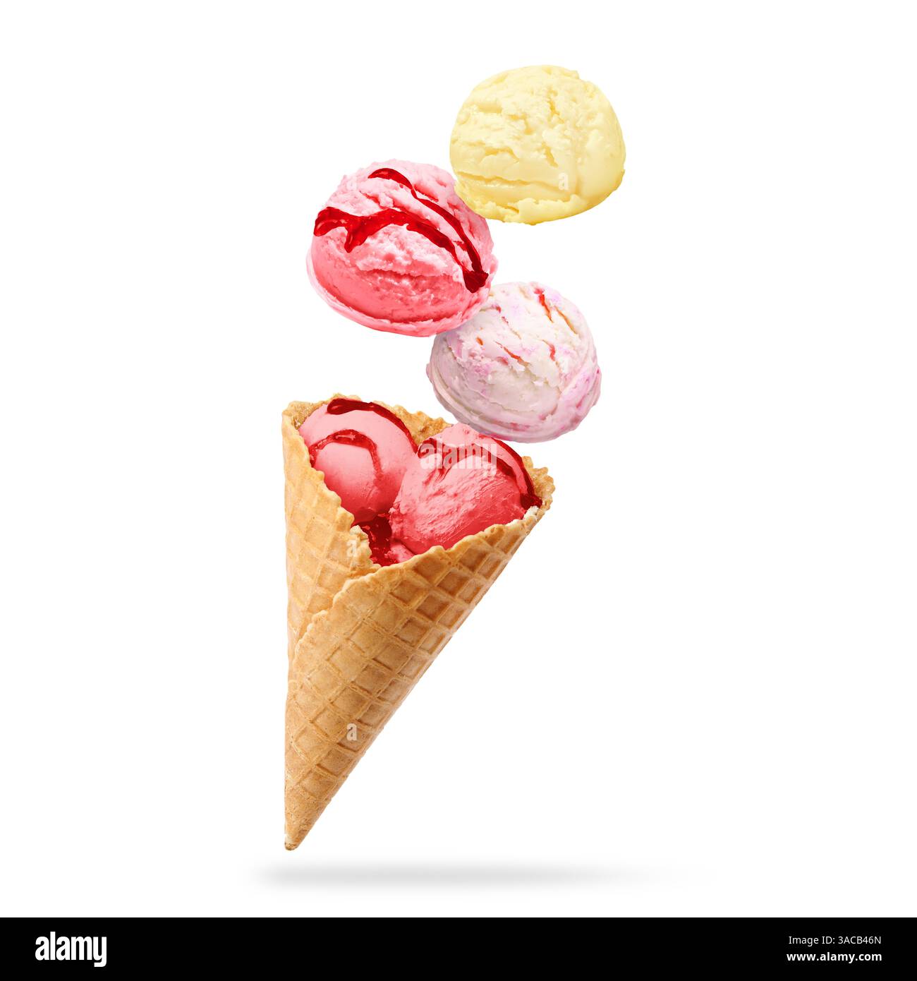 Ice cream scoops and waffle cone in air on white background Stock Photo ...