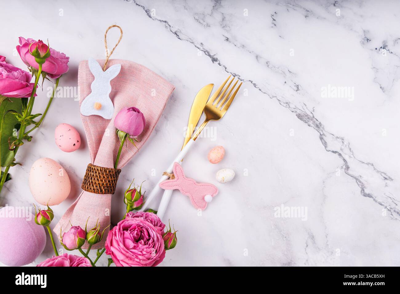 Easter Brunch Table with Spring Flowers and Decor Stock Photo