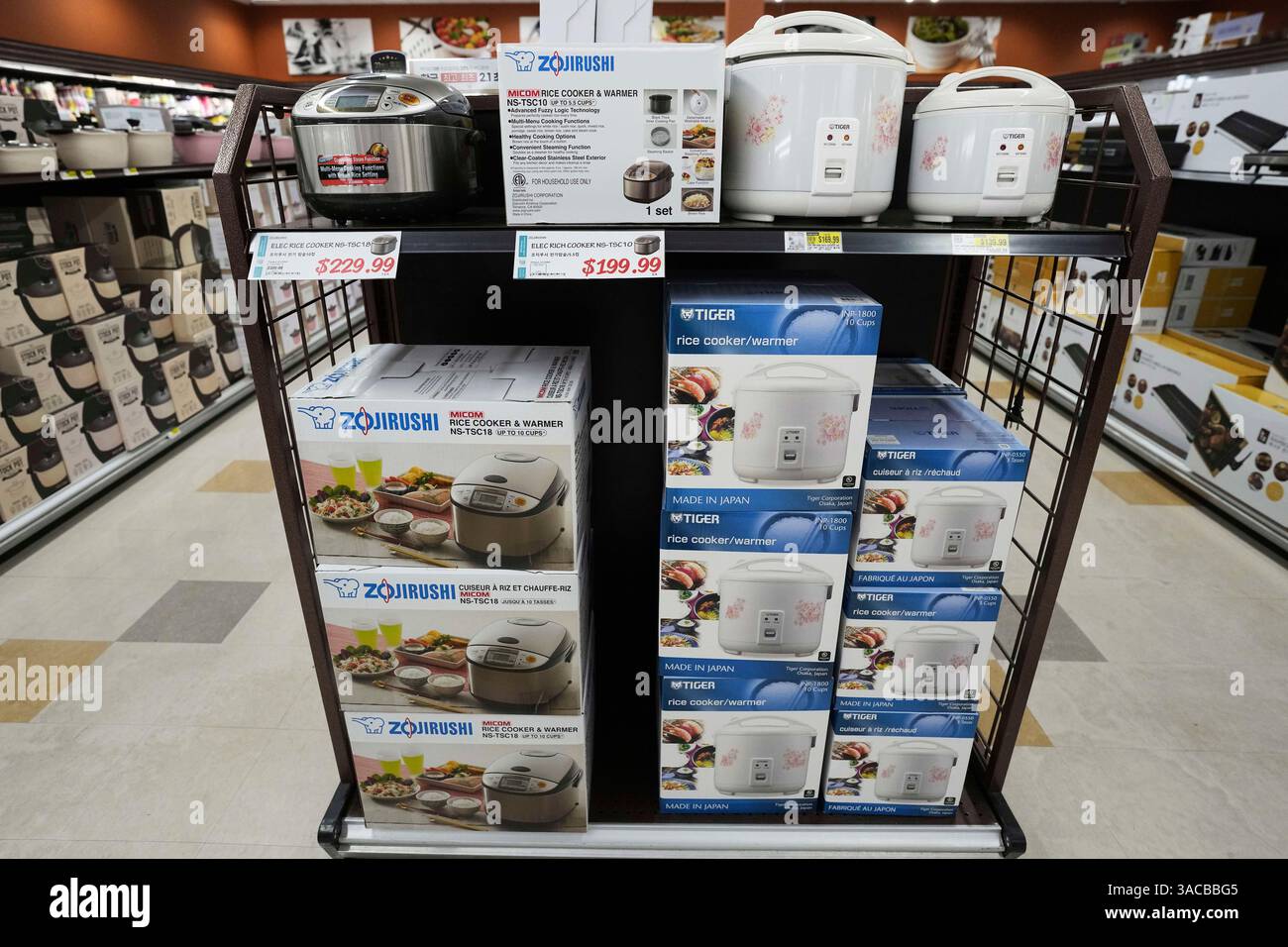 Electric rice cookers imported from Japan are displayed at the H Mart ...