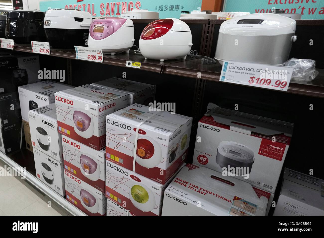 Electric rice cookers imported from Korea are displayed at the H Mart ...