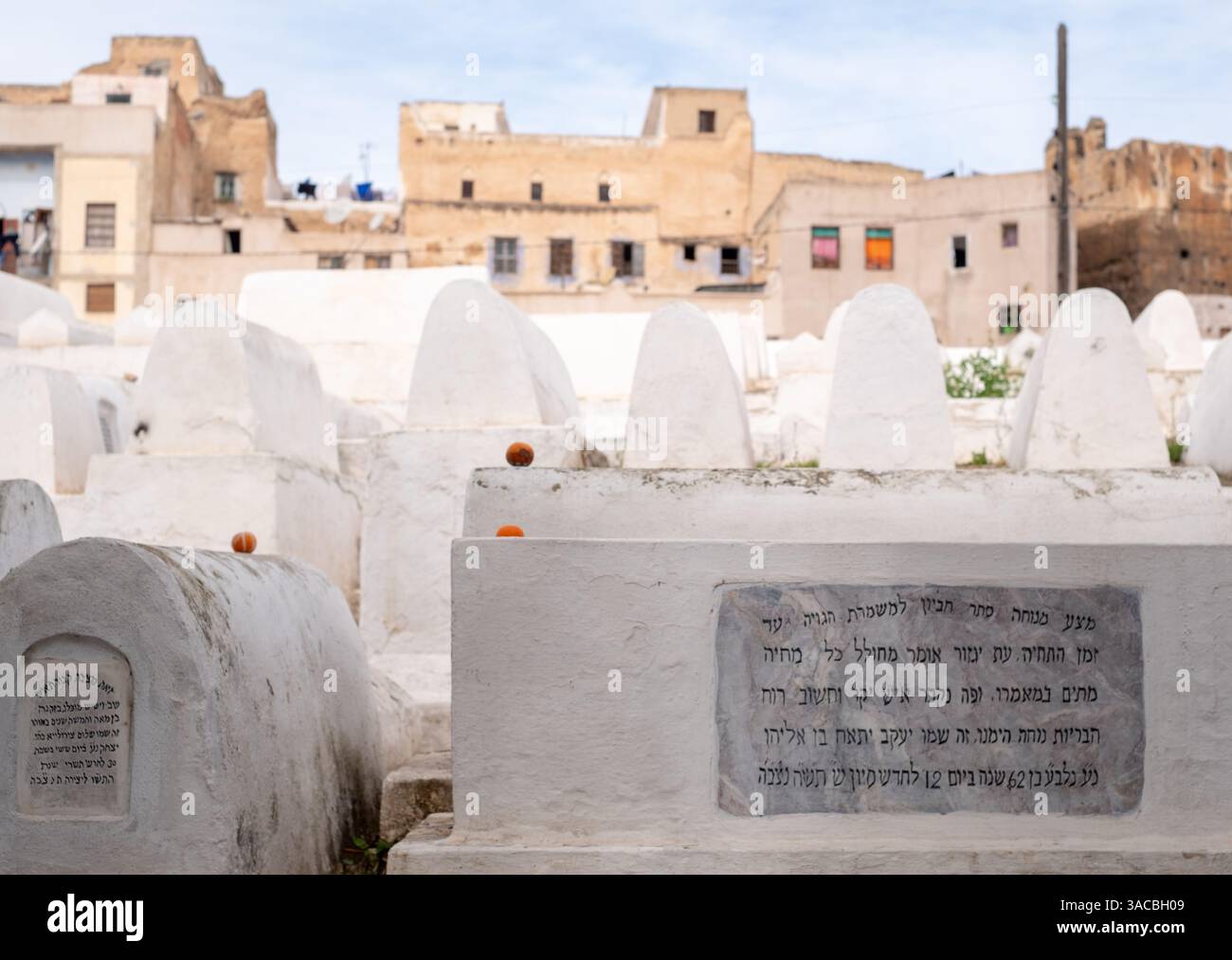 White painted gravestones in the historic Jewish Cemetery in the Mellah ...