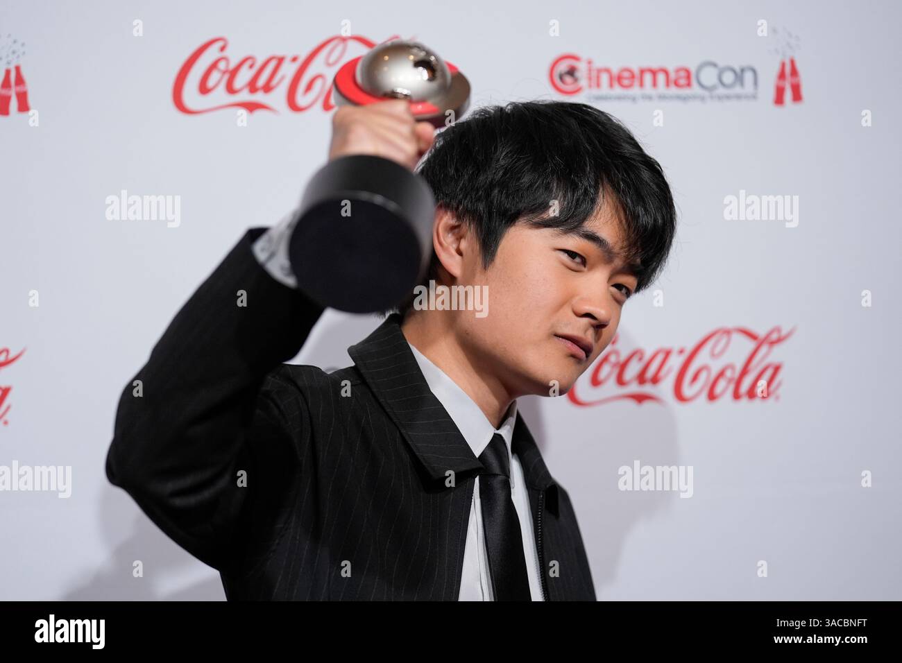Ben Wang poses with the star of tomorrow award at the Big Screen ...