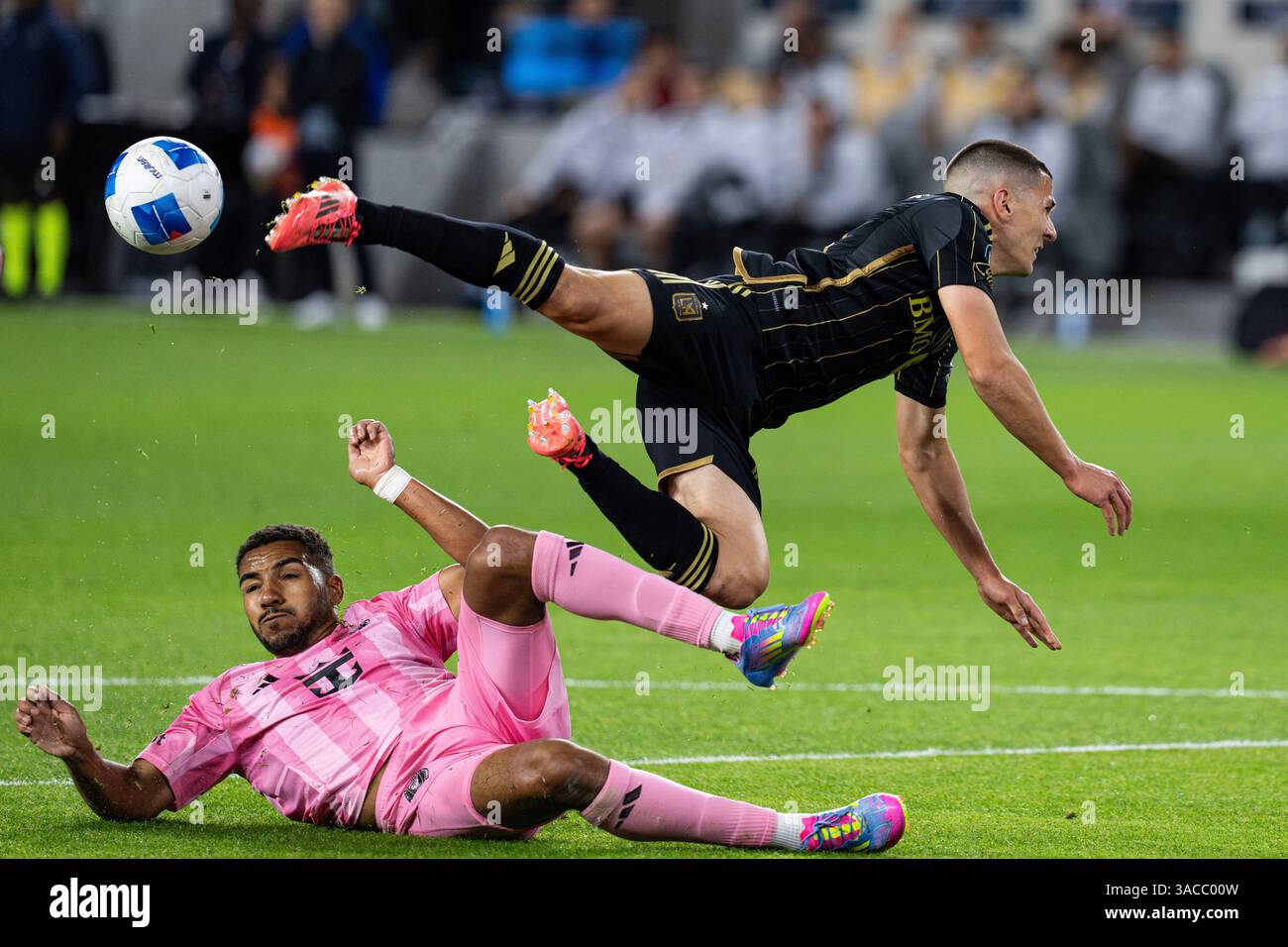 Inter Miami CF midfielder Yannick Bright (42) completes a slide tackle ...