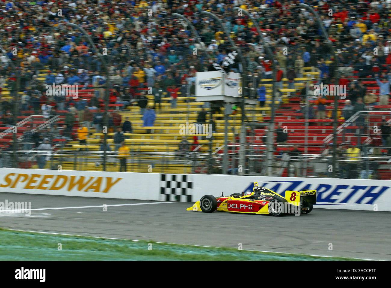 Scott Sharp (USA) Kelley Racing Dallara/Chevrolet takes the chequered ...