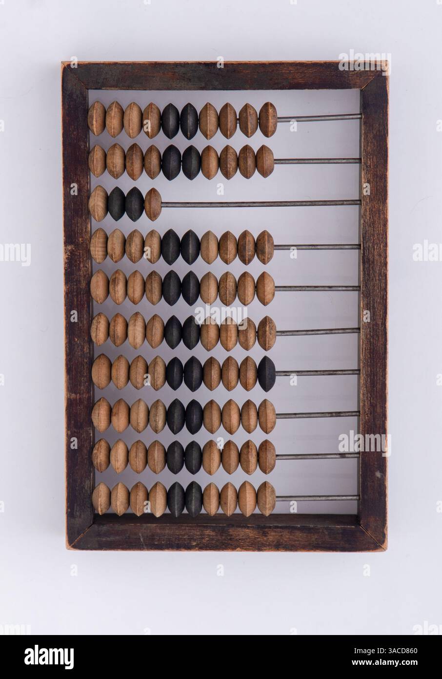 Vintage Wooden Abacus on White Background. Old tool for calculation. Retro calculator Stock Photo