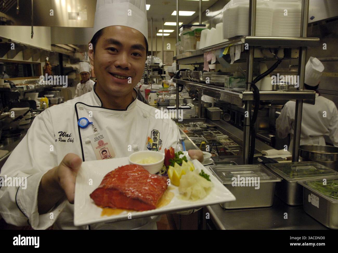 Room Chef Glen Wai with dinner plate of  Smoked Sea Bass $32.80 at Koi Palace kitchen Thunder Valley Casino, 1200 Athens Ave., Lincoln Placer County.  The Sacramento Bee Erhardt Krause March 27, 2007 Stock Photo