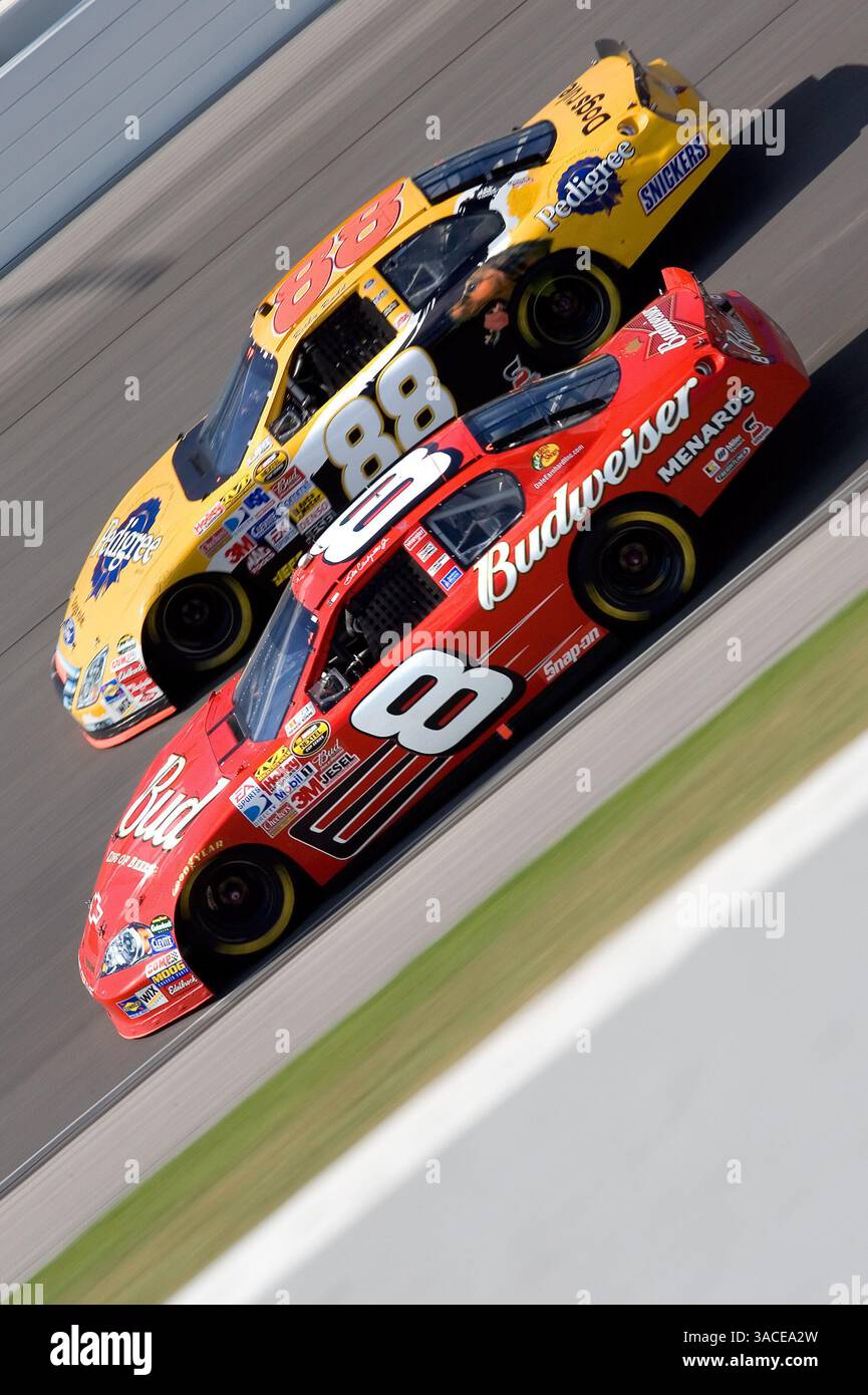 Dale Jr. (8) and Ricky Rudd battle entering turn three at the ...