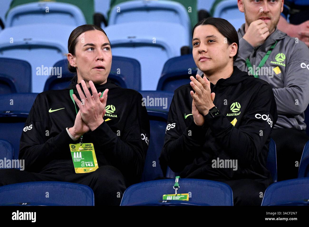 Mackenzie Arnold and Sam Kerr of Australia watch on during the Women's