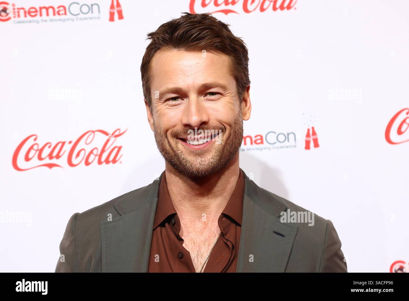 Glen Powell, recipient of the Star of the Year award, arrives for the