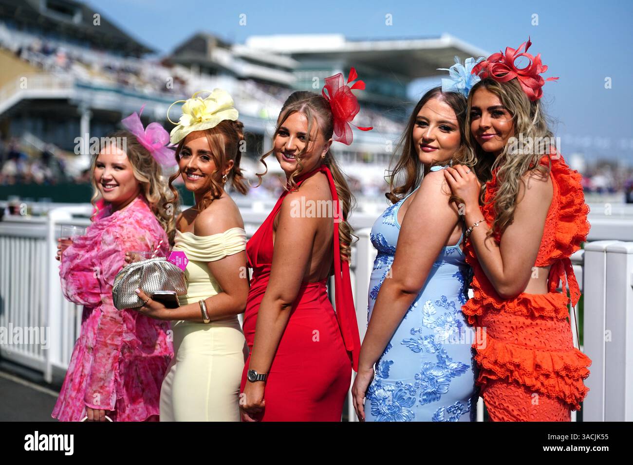 Randox Races Racegoers pose for photographs on day two of the Randox Grand National ...