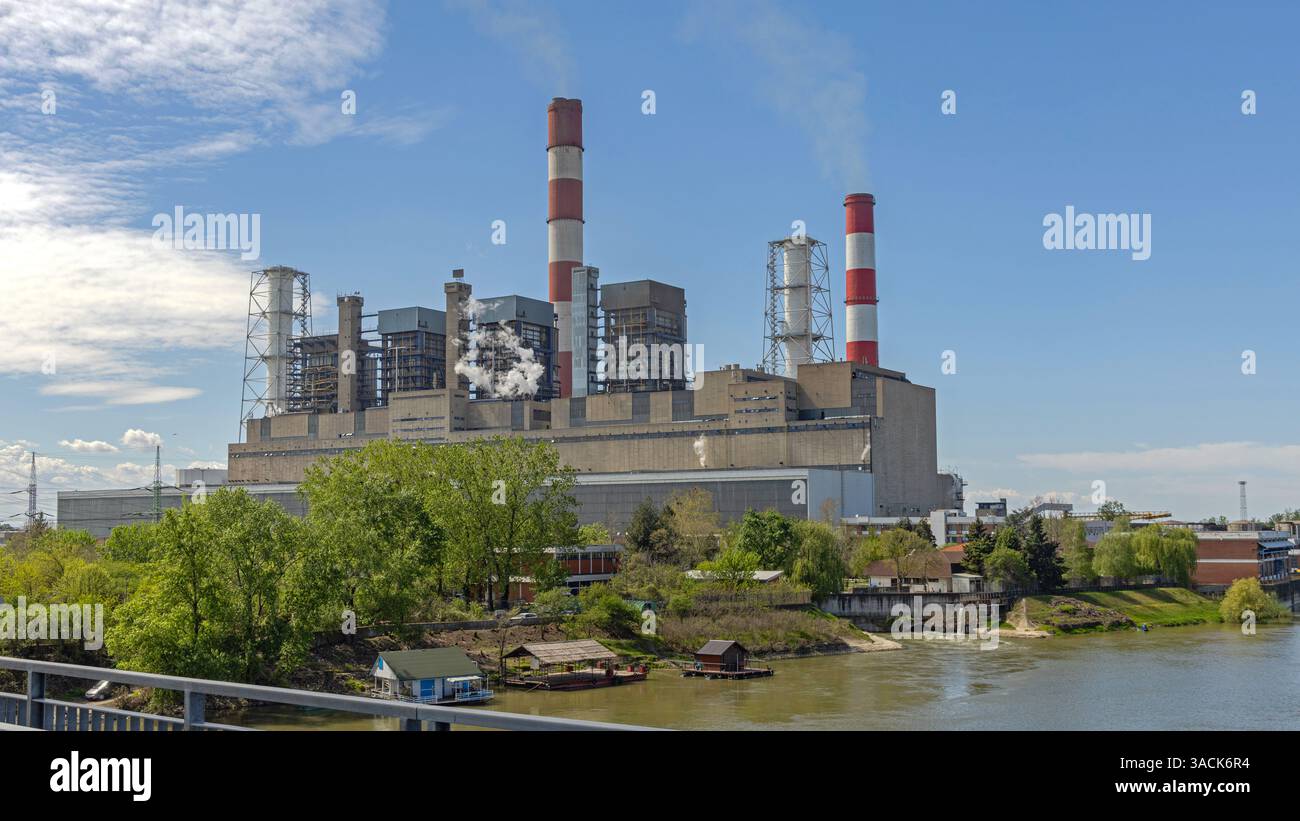 Obrenovac, Serbia - April 04, 2024: Thermal Power Plant Facility in Urovci at River Sava Spring Day. Stock Photo