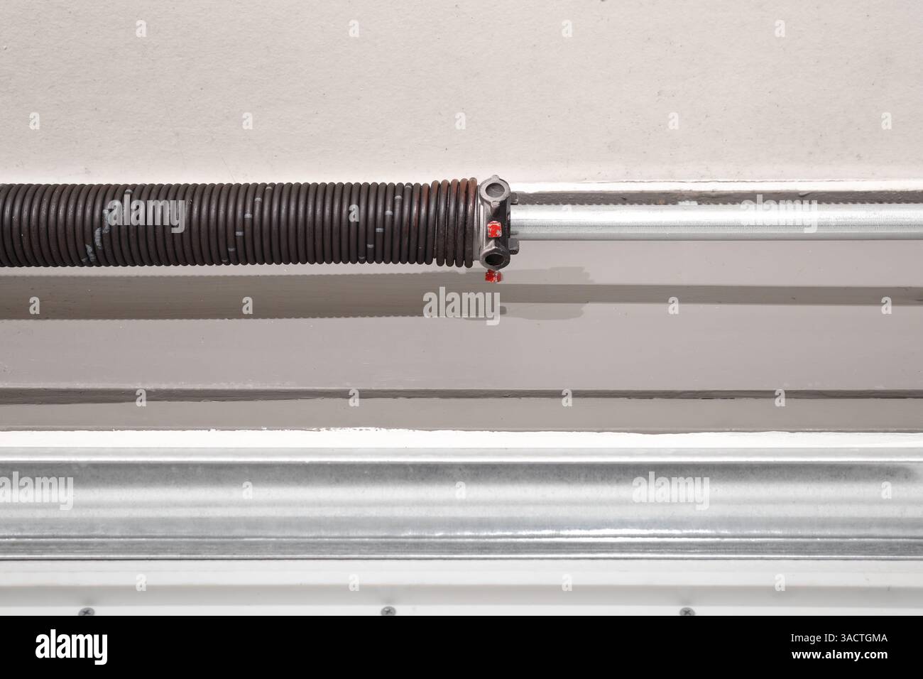 Garage door spring or torsion spring from overhead sectional door