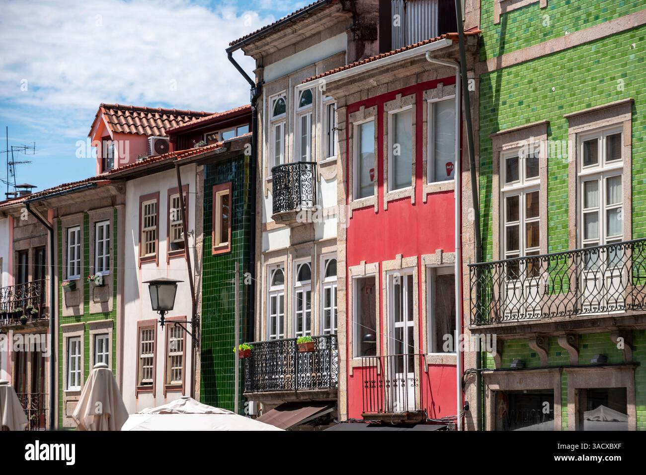 Traditional colorful tiles at decorating the facades of residential ...