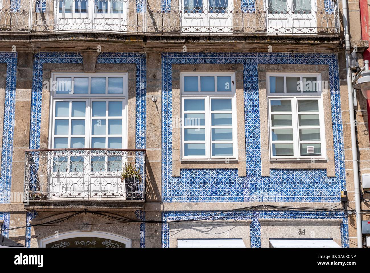 Traditional blue tiles on the facade of an old house in the center of Braga, Portugal Stock Photo