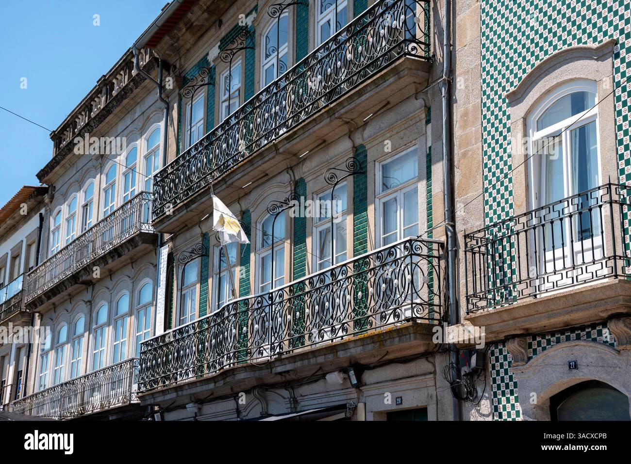 Traditional house facade with ceramic tiles and balconies in Viana do Castelo, Portugal Stock Photo